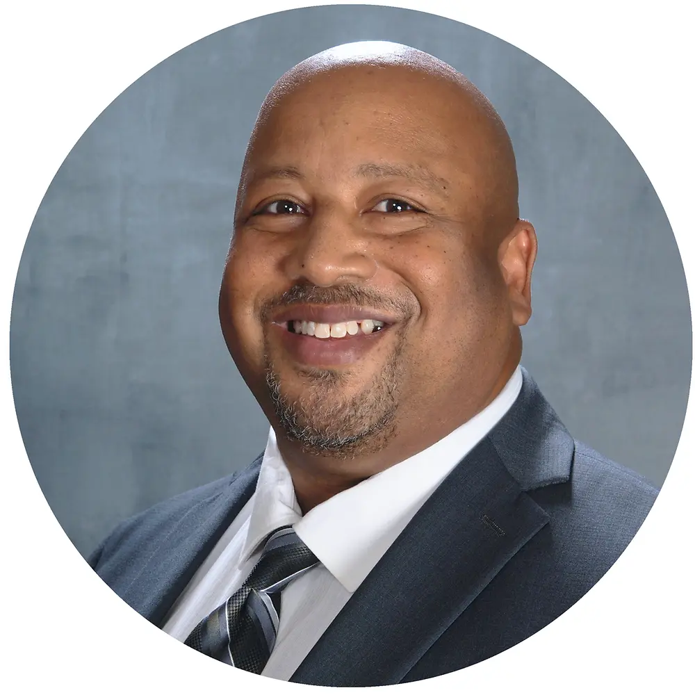 man smiling into camera 