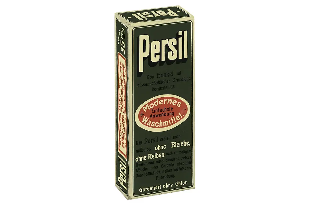 Dunkelgrünes Produktpäckchen von Persil aus dem Jahr 1907.
