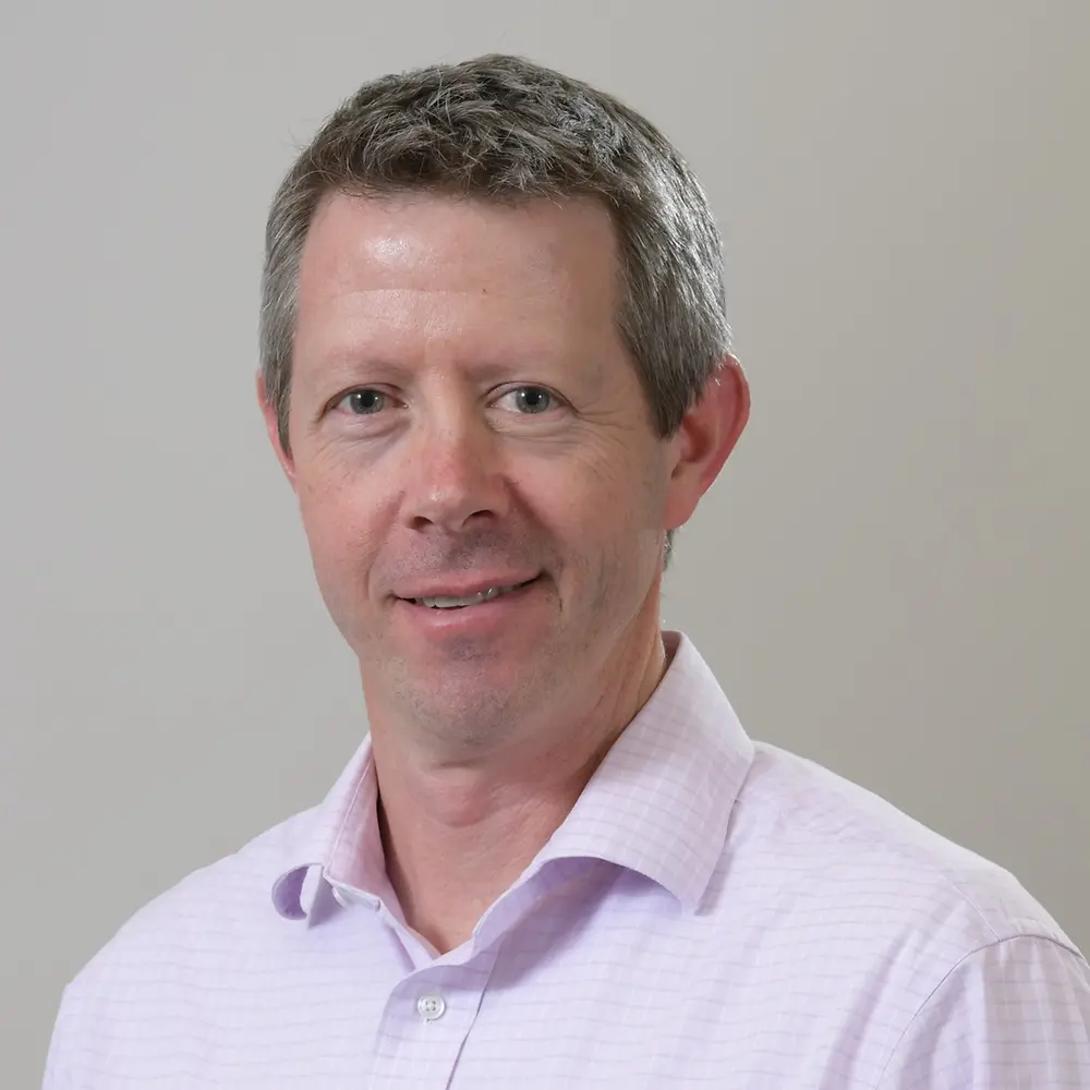 man smiling into camera