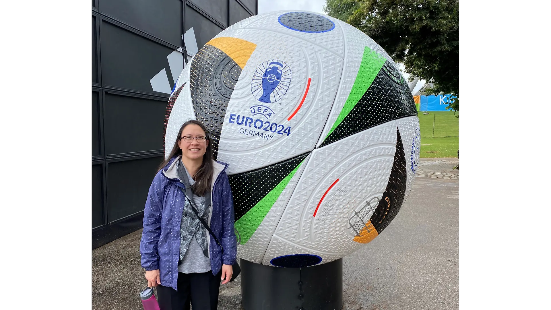 Becky in front of the Euro2024 soccer ball in Munich, Germany.