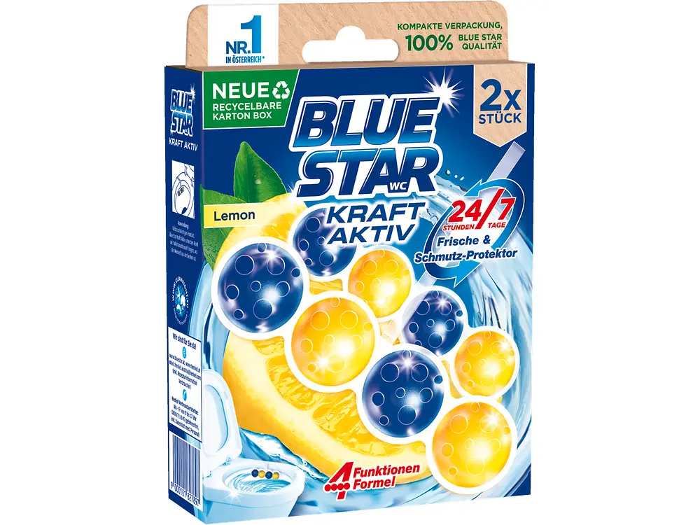 Packaging of Blue Star WC Kraft Aktiv toilet rim block in the Lemon variant. The box shows blue and yellow cleaning balls in front of a lemon slice, with text highlighting features such as a recyclable carton box, 24/7 freshness, dirt protection, and a 4‑function formula. The pack contains two pieces. 